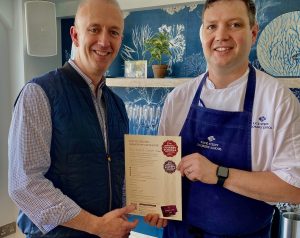 Nick Evans of Rick Stein's Cookery School Awarded Centre of Excellence by James Day of ICSA